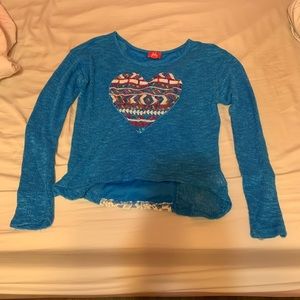 Heart shaped sweater with lace backing
